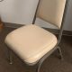 Stackable chair with padded seat, cream