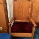 Blue padded pews, interlocking choir chairs, and presider chairs